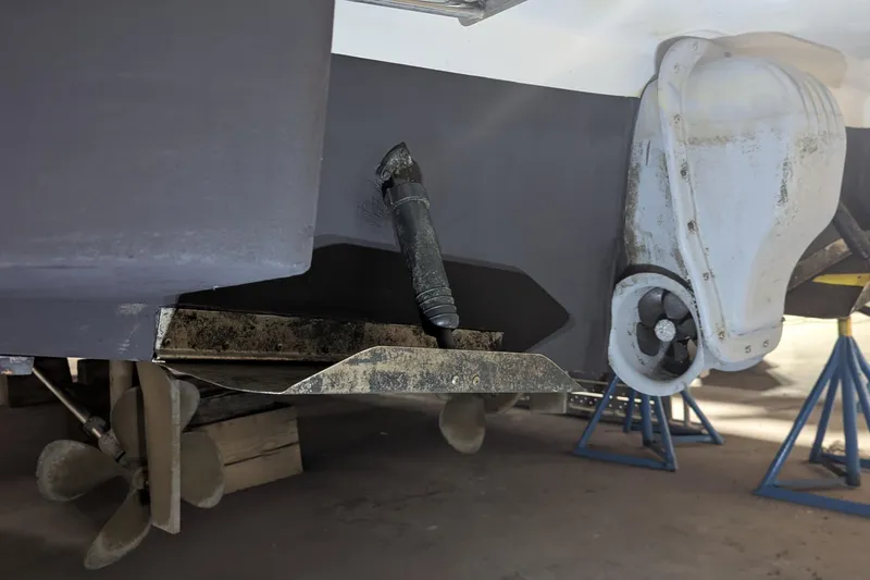 Slide: The Image of 1996 Carver 355 Aft Cabin Motor Yacht underside with propeller and rudder details. - 34