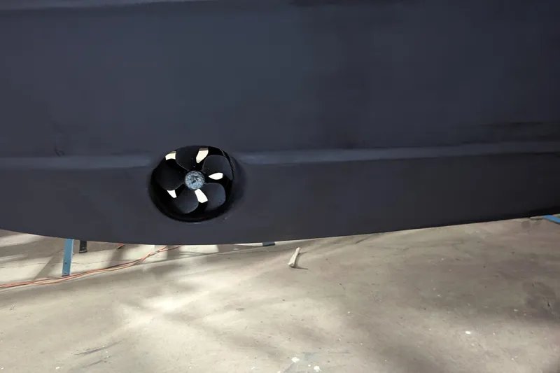 Slide: The Image of 1996 Carver 355 Aft Cabin Motor Yacht hull with bow thruster detail. - 31