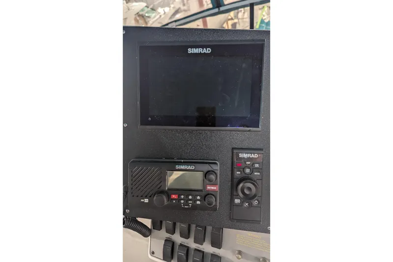 Slide: The Image of Simrad navigation system on 1996 Carver 355 Aft Cabin Motor Yacht dashboard. - 40