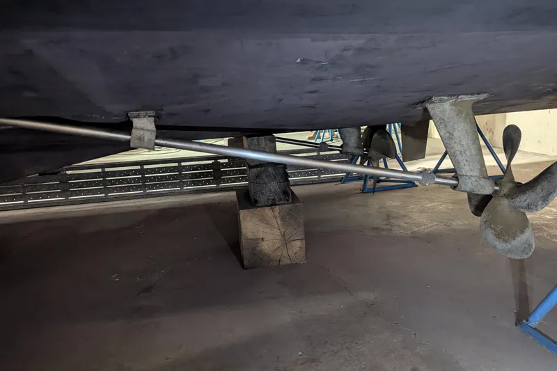 Slide: The Image of 1996 Carver 355 Aft Cabin Motor Yacht propeller and shaft detail in dry dock. - 42