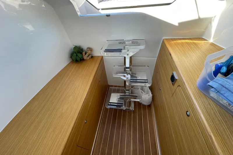 Slide: The Image of Modern interior of 2023 Skipper-BSK BSK 38 boat with wooden flooring and compact storage. - 27