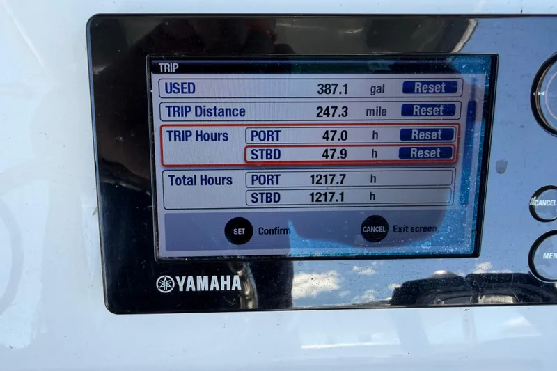Slide: The Image of Yamaha display showing trip data for 2015 Contender 32 ST boat. - 35