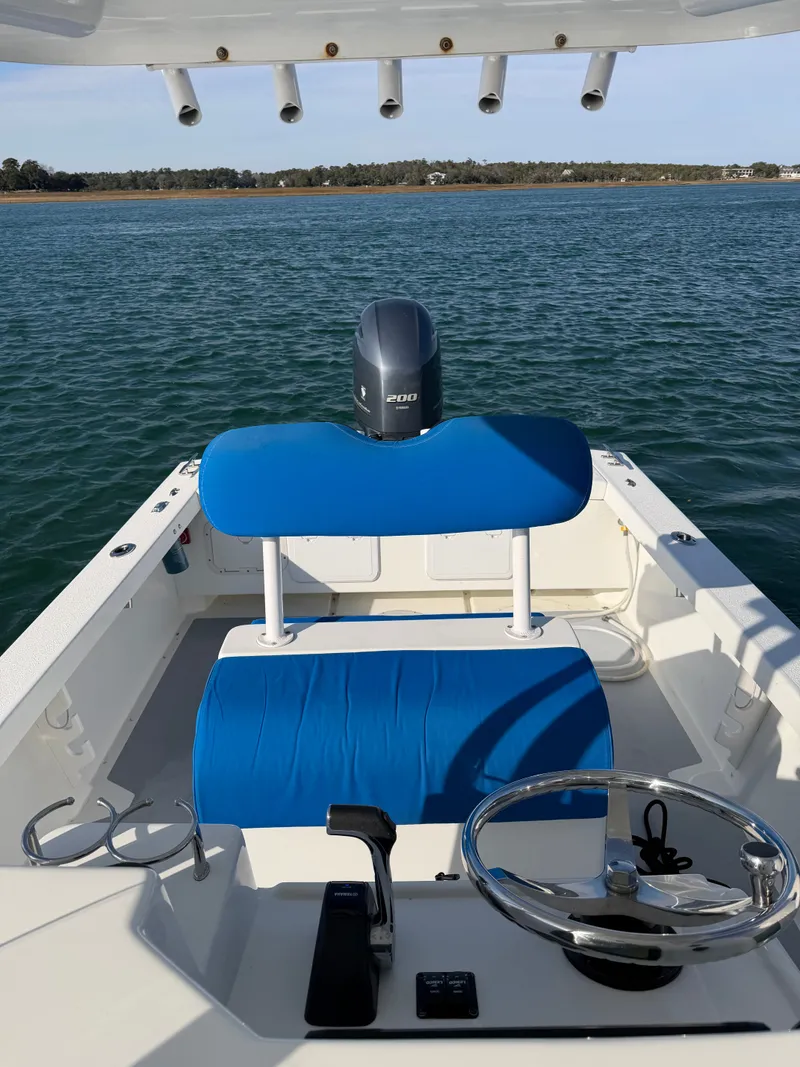 Slide: The Image of Eastern 22 Center Console boat, 2022 model, on calm water. - 16