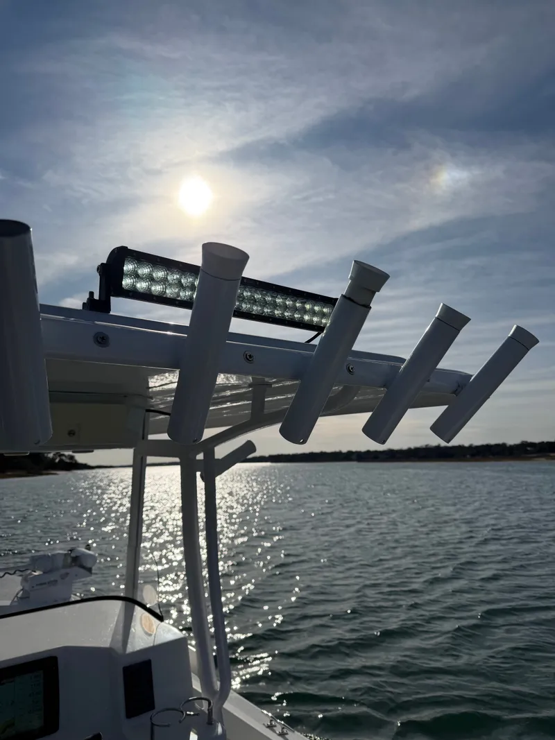 Slide: The Image of Eastern 22 Center Console boat at sunset on the water, 2022 model. - 18