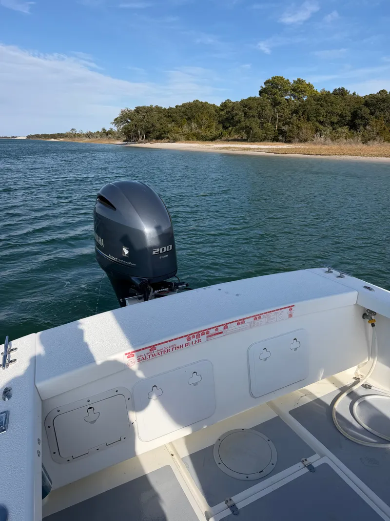 Slide: The Image of Eastern 22 Center Console boat from 2022 on calm waters. - 20