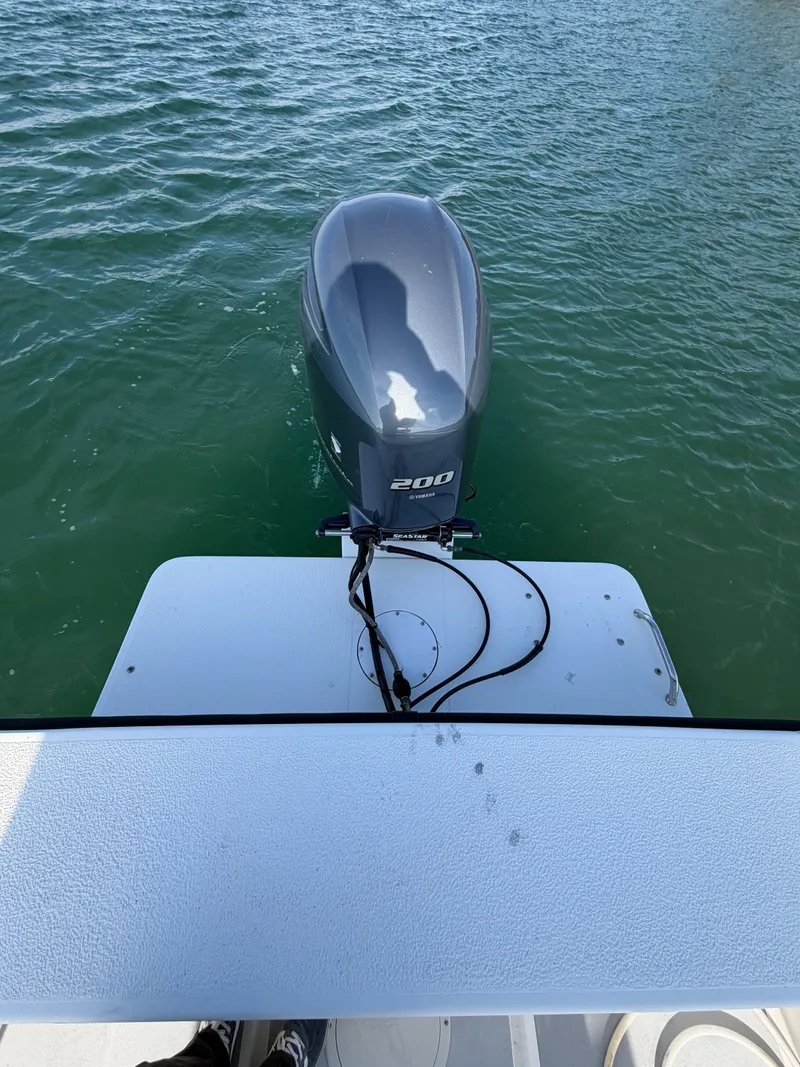 Slide: The Image of Outboard motor of a 2022 Eastern 22 Center Console boat. - 21