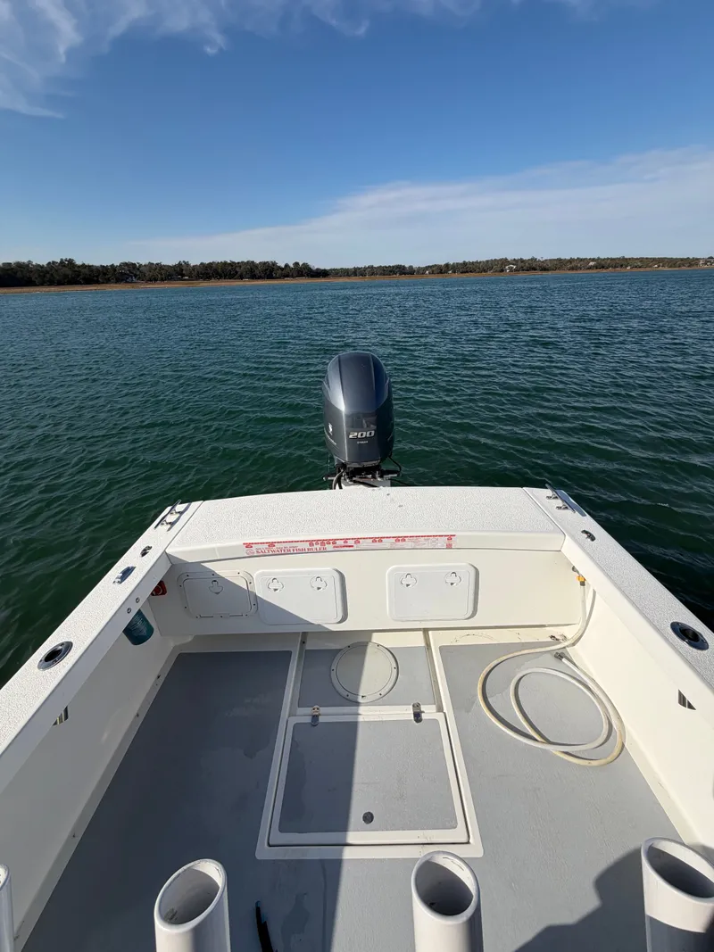 Slide: The Image of Eastern 22 Center Console boat on calm water, 2022 model. - 22