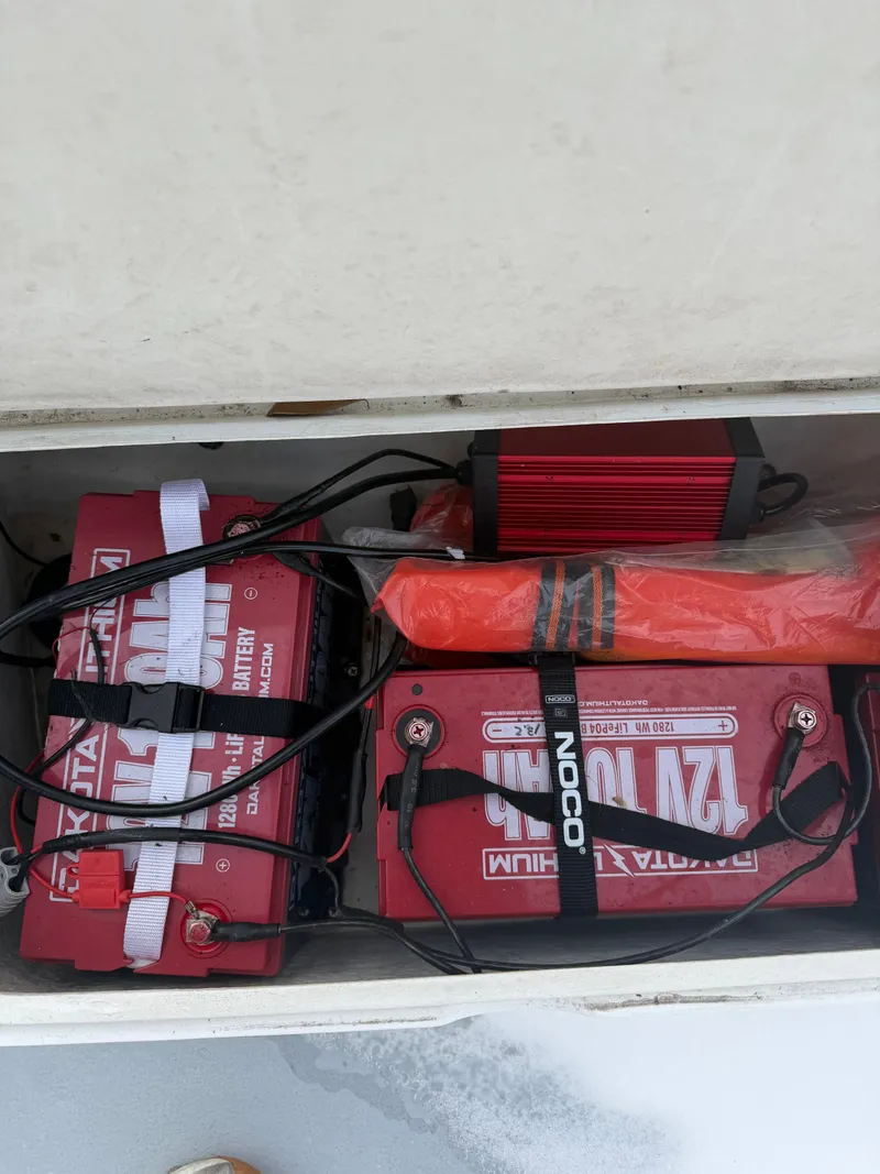 Slide: The Image of Boat batteries and accessories in Eastern 22 Center Console, 2022. - 23