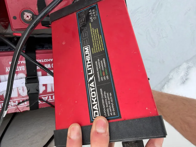 Slide: The Image of Dakota Lithium battery in Eastern 22 Center Console boat. - 24