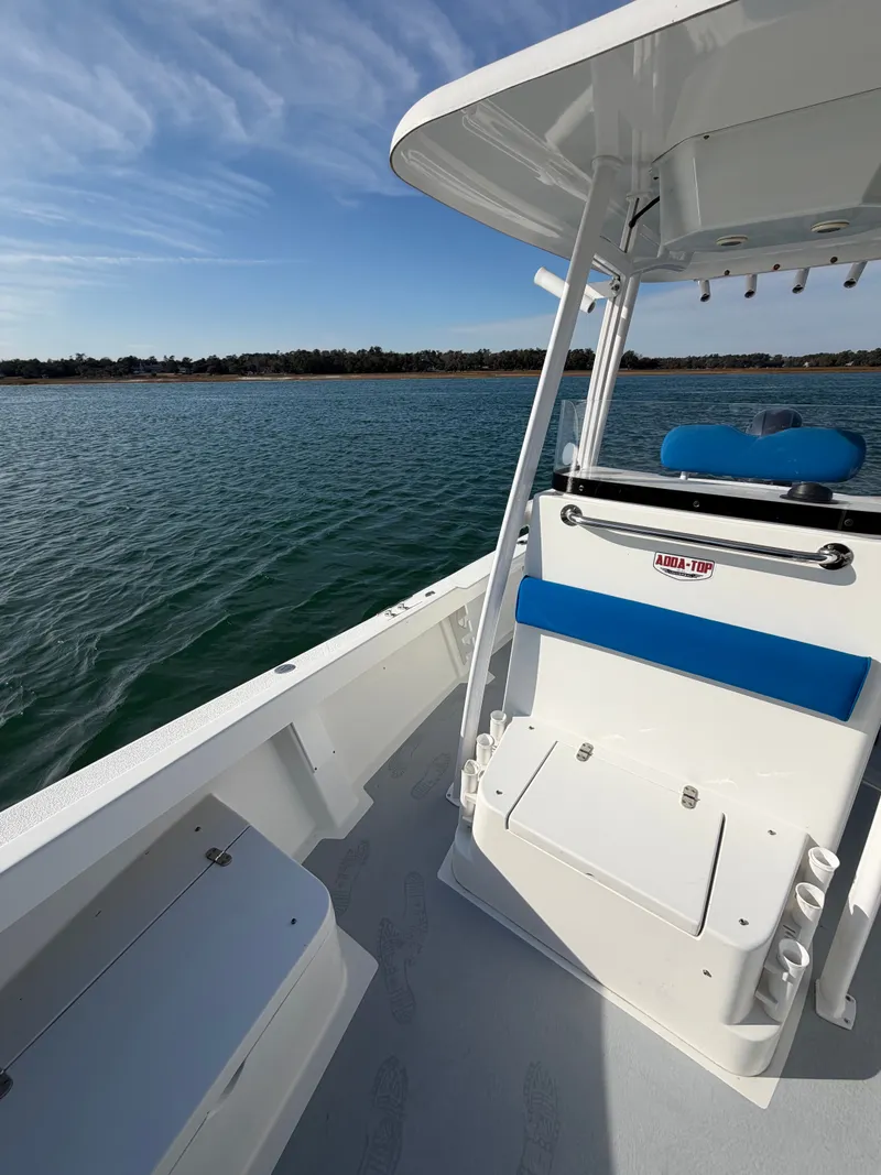 Slide: The Image of 2022 Eastern 22 Center Console boat on calm water. - 9