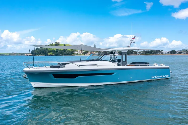 The Image of Nimbus Tender 11 boat 2025 on calm water under sunny skies. - 0