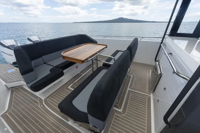 Slide: The Image of Nimbus Tender 11, 2025, featuring stylish deck seating area. - 16