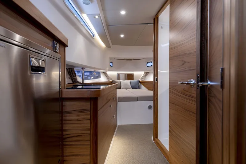 Slide: The Image of Interior of Nimbus Tender 11 yacht, 2025 model, featuring modern amenities. - 19