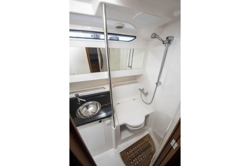 Slide: The Image of Interior of Nimbus Tender 11 yacht, bathroom with shower and sink, year 2025. - 22