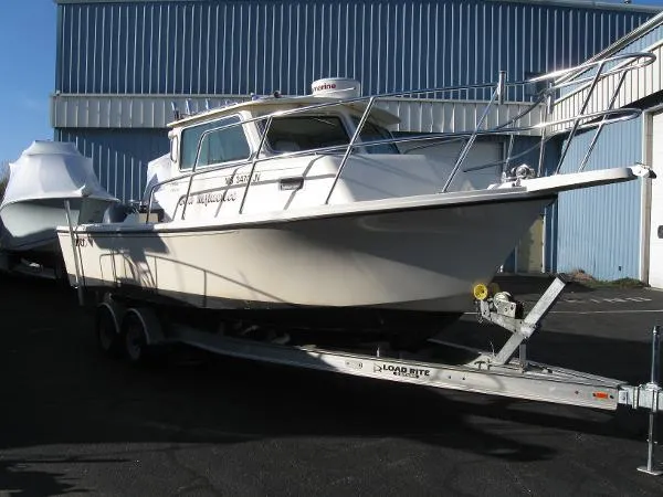 Slide: The Image of Parker Marine 2520 Modified V Sport Cabin 2002 - 1