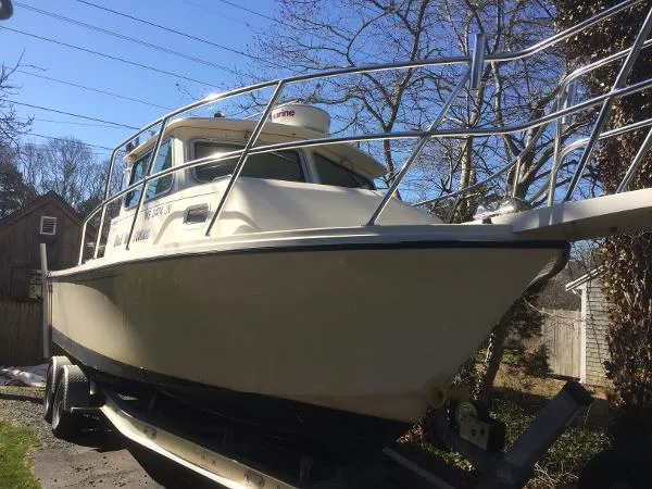 Slide: The Image of Parker Marine 2520 Modified V Sport Cabin 2002 - 3