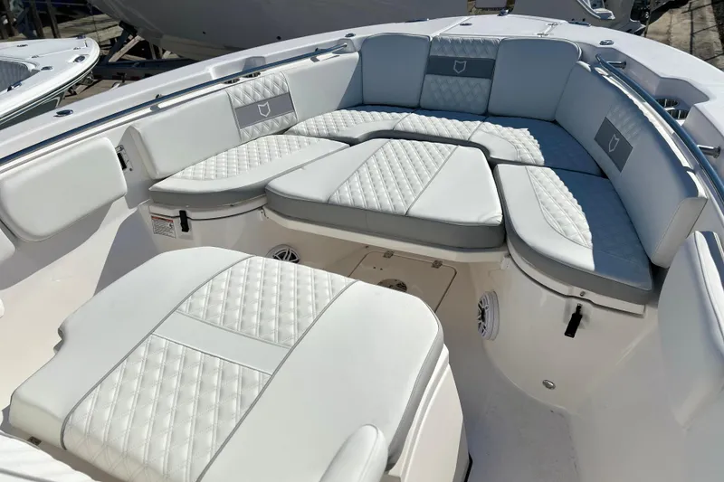 Slide: The Image of Luxurious seating on 2026 Sea Fox 288 Commander boat, featuring elegant white upholstery. - 10