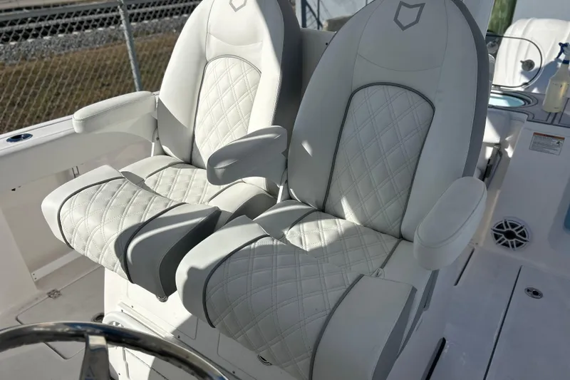Slide: The Image of Luxurious seating on 2026 Sea Fox 288 Commander boat, featuring elegant diamond stitching. - 14
