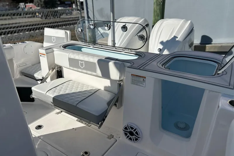 Slide: The Image of 2026 Sea Fox 288 Commander boat interior with seating and storage compartments. - 22