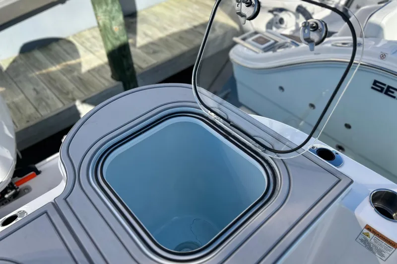Slide: The Image of Open hatch on 2026 Sea Fox 288 Commander boat, showcasing storage compartment. - 24