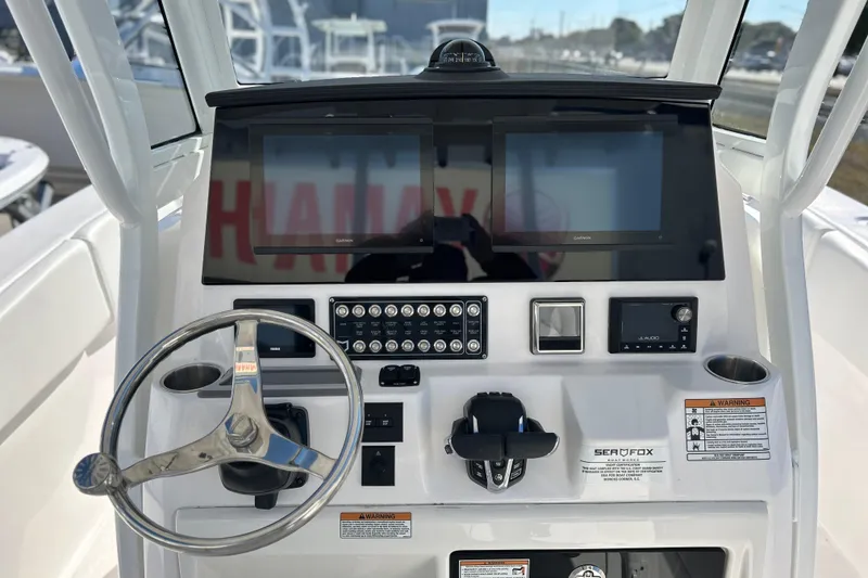 Slide: The Image of Helm of 2026 Sea Fox 288 Commander with dual displays and controls. - 3