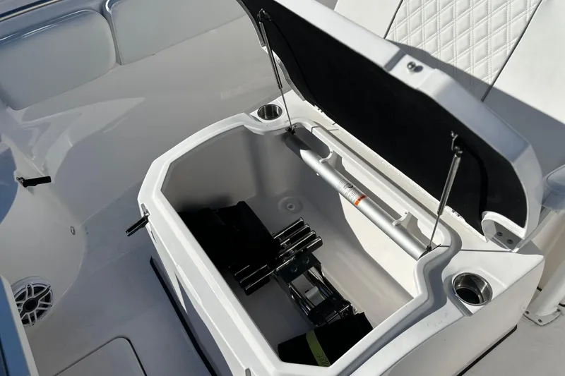 Slide: The Image of Open storage compartment on 2026 Sea Fox 288 Commander boat, featuring sleek white interior design. - 35