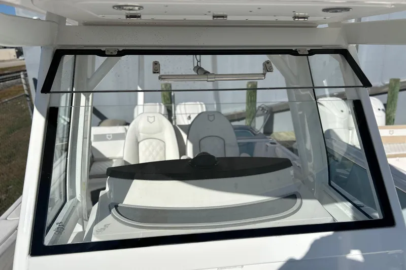 Slide: The Image of 2026 Sea Fox 288 Commander boat interior with modern seating and windshield view. - 36