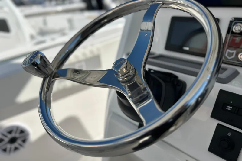 Slide: The Image of Steering wheel of 2026 Sea Fox 288 Commander boat, featuring modern controls and sleek design. - 6