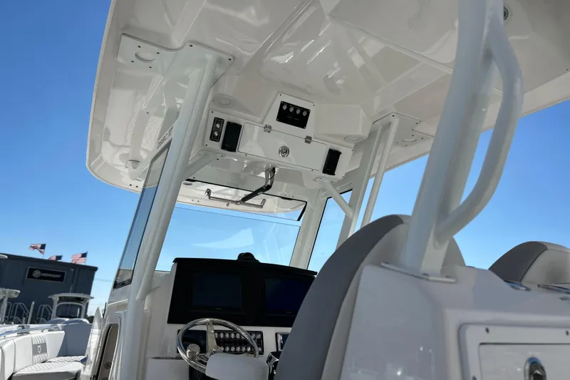 Slide: The Image of 2026 Sea Fox 288 Commander boat interior with modern dashboard and steering wheel. - 7
