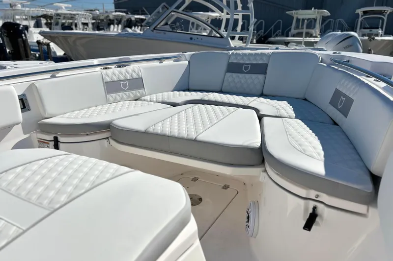 Slide: The Image of Luxurious seating on 2026 Sea Fox 288 Commander boat, featuring elegant white upholstery. - 9