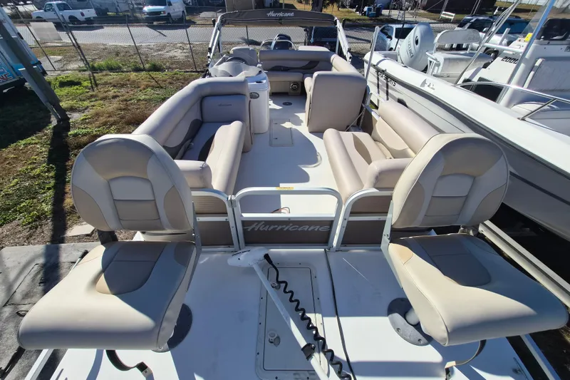 Slide: The Image of 2013 Hurricane FunDeck 226 boat with spacious seating and modern design. - 13
