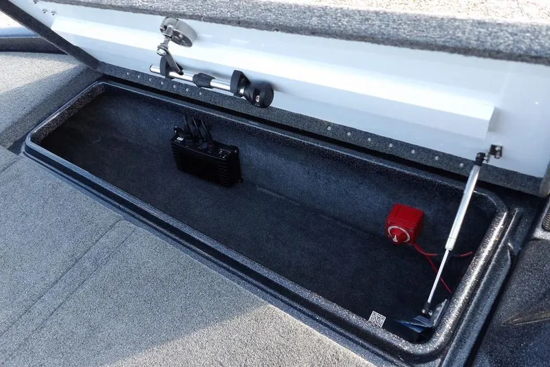 Slide: The Image of 2024 Phoenix 721 ProXP storage compartment with electronic components and wiring. - 36