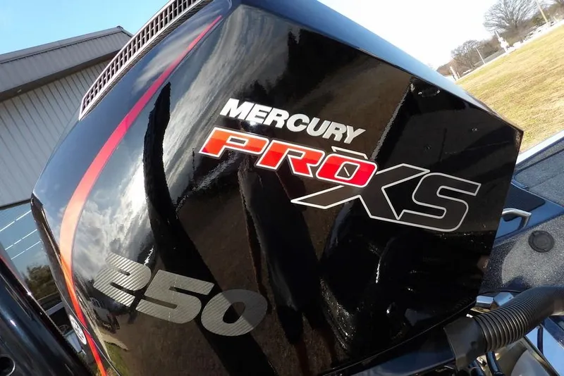 Slide: The Image of 2024 Phoenix 721 ProXP with Mercury ProXS 250 engine, close-up view. - 37