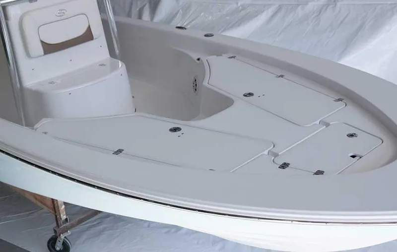 Slide: The Image of 2013 Sportsman Masters 247 Bay Boat with Yamaha engine in a sunny marina. - 5