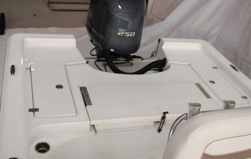 Slide: The Image of 2013 Sportsman Masters 247 Bay Boat on trailer under bright sun. - 7