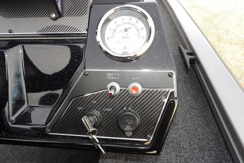 Slide: The Image of Dashboard of 2026 Crestliner XFC 189 boat with RPM gauge and controls. - 23