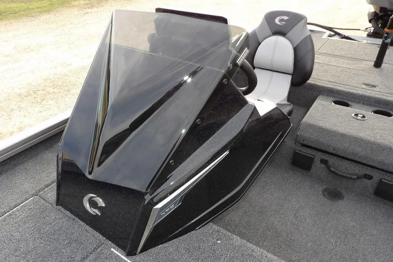 Slide: The Image of 2026 Crestliner XFC 189 boat interior with sleek black console and cushioned seat. - 29