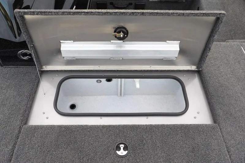 Slide: The Image of 2026 Crestliner XFC 189 boat storage compartment with open lid, showcasing interior space. - 30