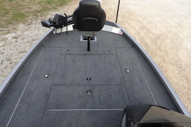 Slide: The Image of 2026 Crestliner XFC 189 boat deck with seating and storage compartments. - 31