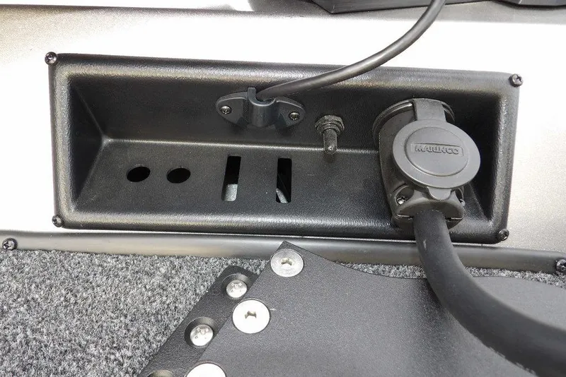 Slide: The Image of 2026 Crestliner XFC 189 boat electrical panel with Minn Kota plug and wiring. - 34