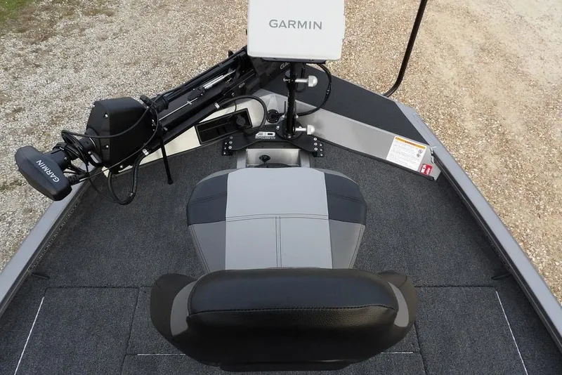 Slide: The Image of 2026 Crestliner XFC 189 boat interior with Garmin equipment and seating. - 36