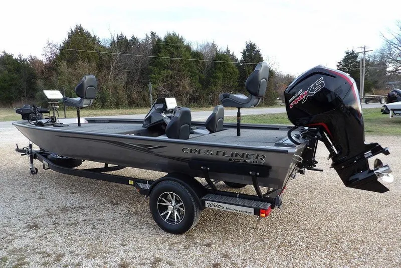 Slide: The Image of 2026 Crestliner XFC 189 fishing boat with Mercury Pro XS engine on trailer. - 4