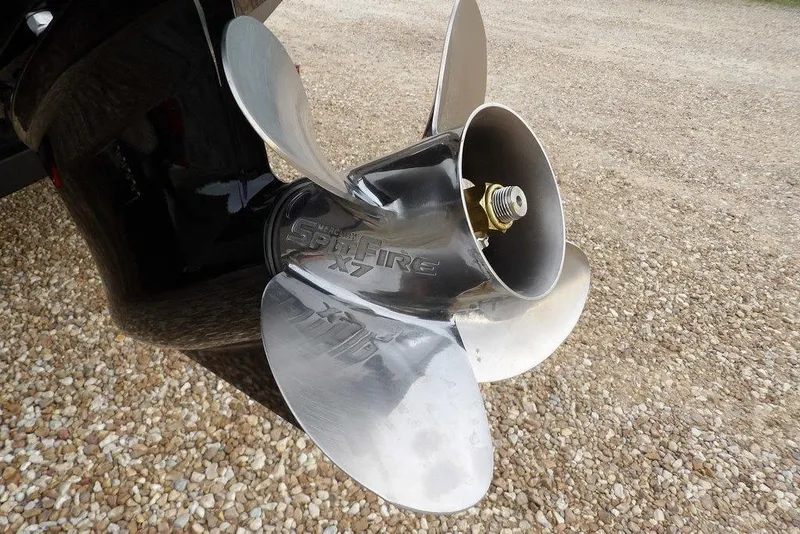 Slide: The Image of Close-up of a Mercury Spitfire X7 propeller on a 2026 Crestliner XFC 189 boat. - 54