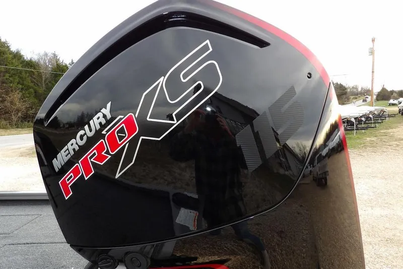 Slide: The Image of Mercury Pro XS engine on 2026 Crestliner XFC 189 boat, reflecting outdoor scenery. - 56