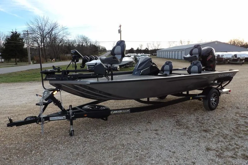 Slide: The Image of 2026 Crestliner XFC 189 fishing boat on trailer, equipped with Garmin technology. - 6