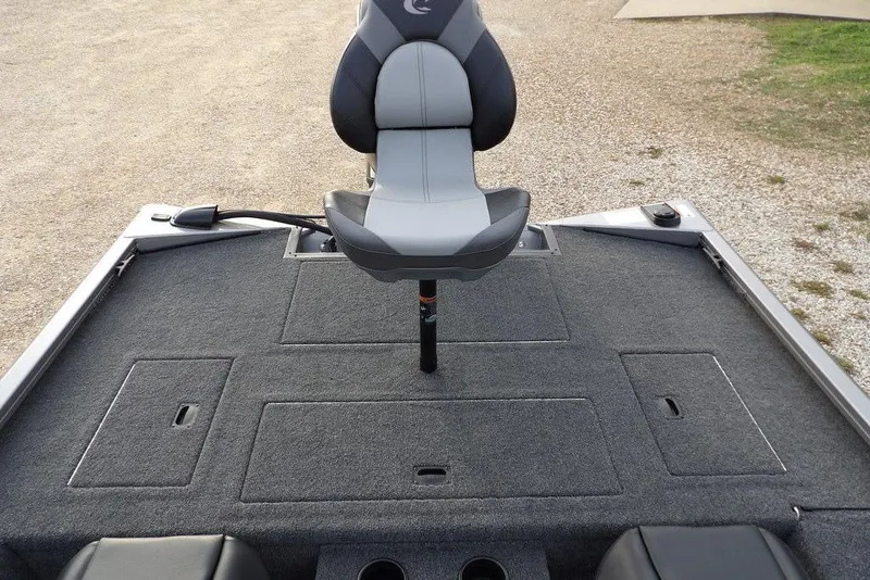 Slide: The Image of 2026 Crestliner XFC 189 boat deck with swivel seat and storage compartments. - 8