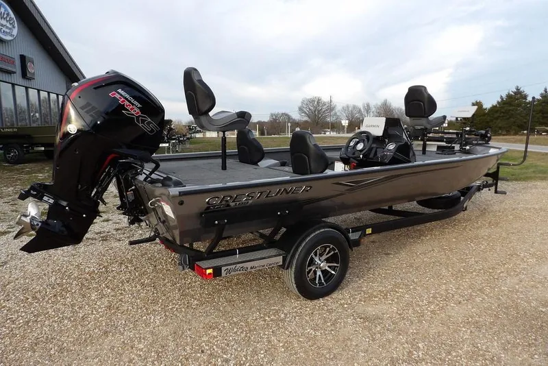Slide: The Image of 2026 Crestliner XFC 189 fishing boat with Mercury engine on a trailer. - 9