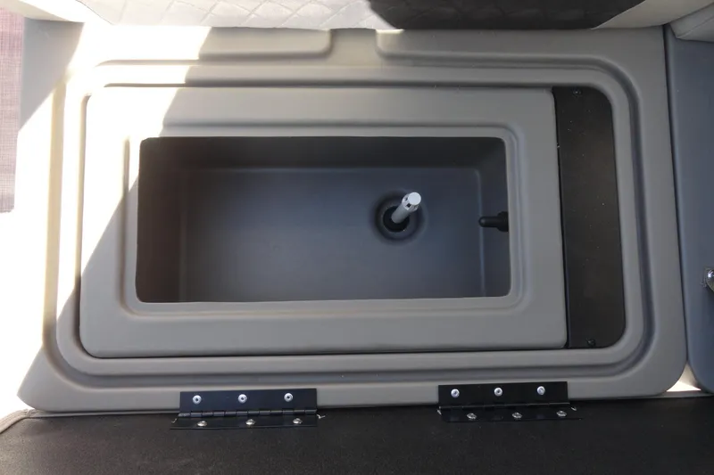 Slide: The Image of 2022 Sun Tracker Fishin' Barge 20 DLX livewell compartment, gray interior, top view. - 16