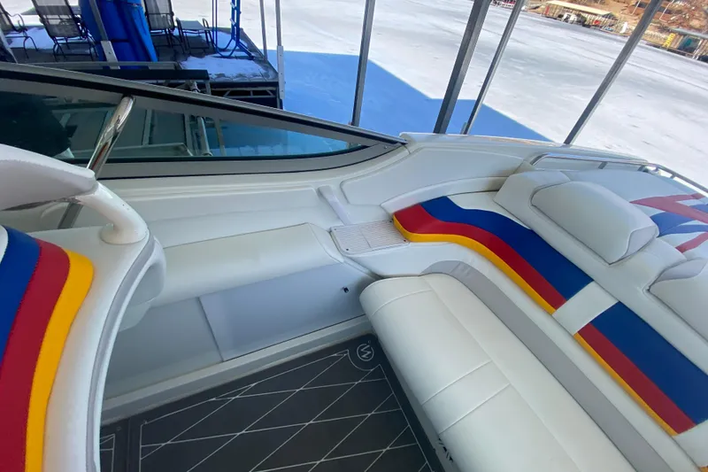 Slide: The Image of 2006 Formula 353 FASTech boat interior with colorful seating and sleek design. - 10