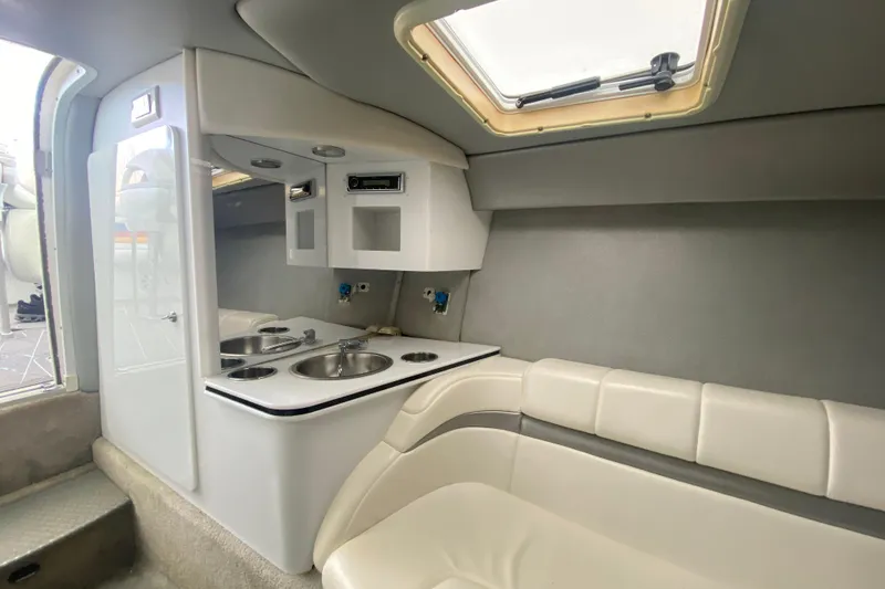 Slide: The Image of 2006 Formula 353 FASTech cabin interior with kitchenette and seating area. - 16